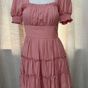 Pretty accentuated waist and tiered dress